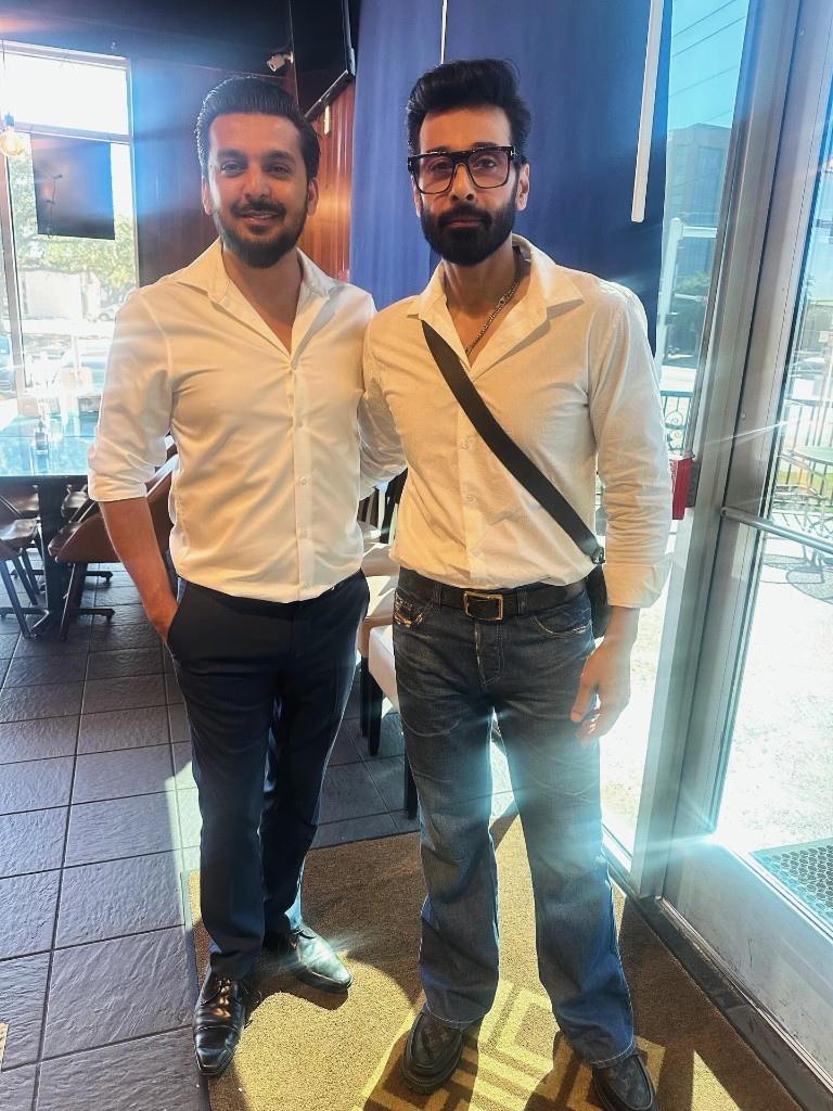 Happy guests at the BK Khan's BBQ restaurant entrance